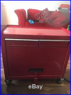 Red Tool Chest And Rolling Tool Cabinet With Assortment Of Tools